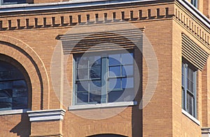 Close up of 6th Floor window in Texas School Book Depository Building, site of JFK assassination, Dallas, TX photo