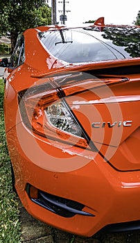 Close-up of a 10th Generation Honda Civic vehicle in Rallye Red
