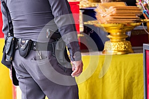 Close up of Thailand& x27;s police pistol, Policeman& x27;s equipment belt