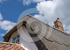 Close-up of a thatched roof seen on an English cottage.