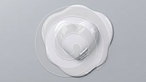 Close up of thick white cream drop falling on light background