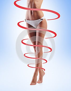 Close-up of thin and beautiful female body. Weight loss, sports, exercising, healthy food and eating, nutrition concept.