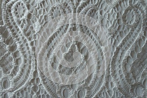 Close-up of thin white lacy fabric