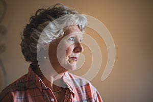 Close up of thoughtful senior woman at home