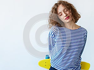 Close up Thoughtful Smiling brunette Girl with curly hair