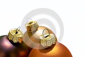 Close-up of three christmas balls on a white background