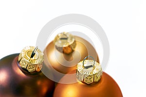 Close-up of three christmas balls on a white background