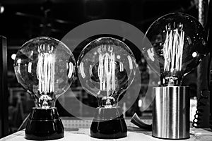 Close up of three litten light bulbs