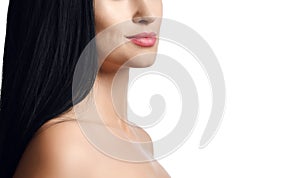 Advertisement concept close up portrait of woman brunette with long straight hair with bare shoulders and slight smile on her lips