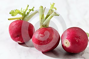 Three Red Raddish on White Background