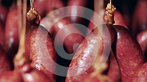 Close up of tied-up hanging sausages