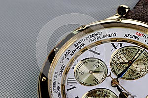 close up on Time zone cities name on luxury world time watch bezel