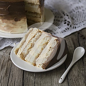 Close up of tiramisu cake. Cream Cake. Piece of Cake on a Plate. Sweet food. Sweet dessert. rustic style