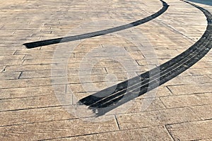 Close-up tire sportcar tread marks on the road