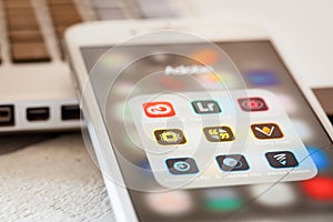Close up to Adobe Creative Cloud apps on iPhone 7 screen
