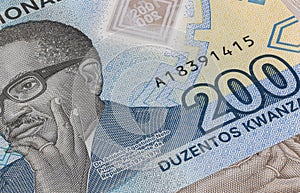 Close up to 500 Kwanza of the Republic of Angola. Polymer banknotes of the African country. Detailed capture of the portrait of