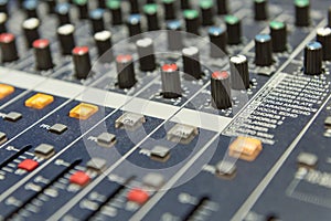 Close up to the mixer table or fader board