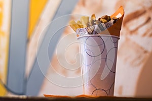 Close-up of tomato Spicy sauce and Fresh French fries, deep fried Homemade Baked potato chips with close-up of spicy sauce and