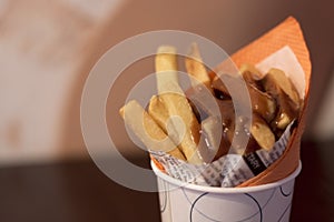 Close-up of tomato Spicy sauce and Fresh French fries, deep fried Homemade Baked potato chips with close-up of spicy sauce and