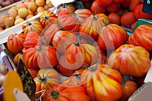 Close-up of tomatoes on display in store