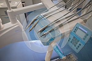Close up of the tools used by a dentist, Dental drills next to the patient`s chair