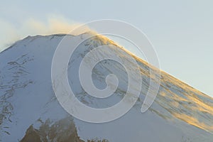 Close up top of beautiful Fuji mountain with snow cover on the top with first light on sunrise, Landmark of Japan