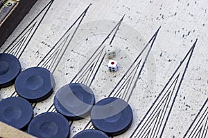 Close-up top shoot of dice of backgammon under open light