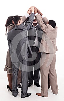 Close up top view of business people putting their hands togethe