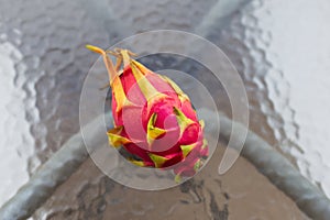 Close-up top view of dragon fruit on glass table