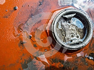 Close up and top view of metal lid was closed the old tank with dense rusty on surface