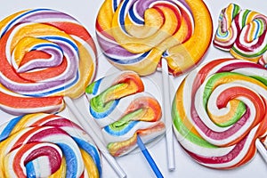 Close up top view of multicolored candy lollies