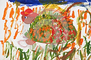 Close up. The tortoise crawls through the thickets near the lake. Creative activities with children 4-5 years old on the