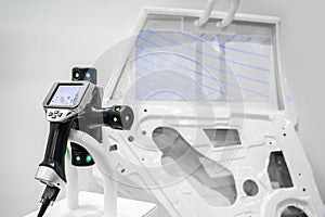 Close up touch probe of Automatic Coordinate measurement machine by CMM, Inspection dimension aluminum automotive parts by cnc photo