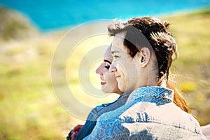 Close-up touching portrait of loving couple. Sensual photo