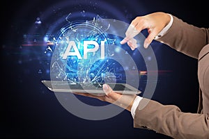 Close-up of a touchscreen with abbreviation.