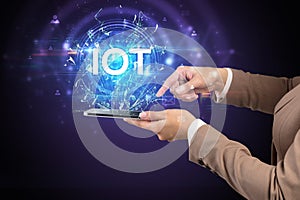 Close-up of a touchscreen with abbreviation.