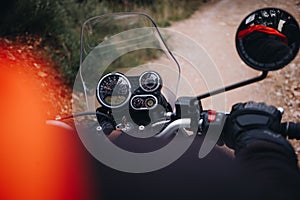 Close up of touring adventure motorcycle handlebar