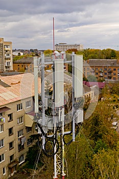 Close-up of tower with 5G and 4G cellular network antenna. Aerial view