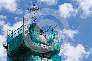 Close-up of the Tower of the Greek-Catholic Church in scaffoldin