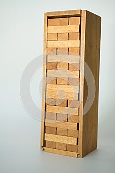 Close up of tower stack from wooden blocks toy