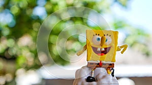 Close up toys made of plastic, spongebob-shaped