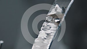 Close-up: traces of welding on a metal part. Spike on metal.