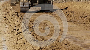 Close up of tracked bulldozers at work