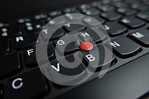 Trackpoint pointing device on Lenovo Thinkpad notebook computer