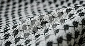 Close-up of a traditional black and white keffiyeh pattern