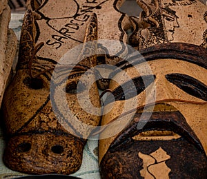 close up of traditional cork masks from Sardinia