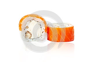 Close-up of traditional fresh japanese seafood sushi rolls with salmon, smocked eel and cream cheese isolated on white