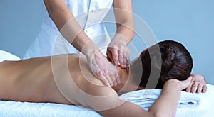 Close-up of traditional healing and recreation massaging treatments. Health, skin care, massage, osteopathy and manual