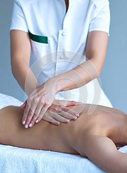 Close-up of traditional healing and recreation massaging treatments. Health, skin care, massage, osteopathy and manual