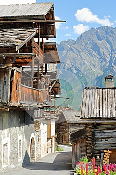 Close-up on traditional houses with traditional wooden balconies in Saint Veran village